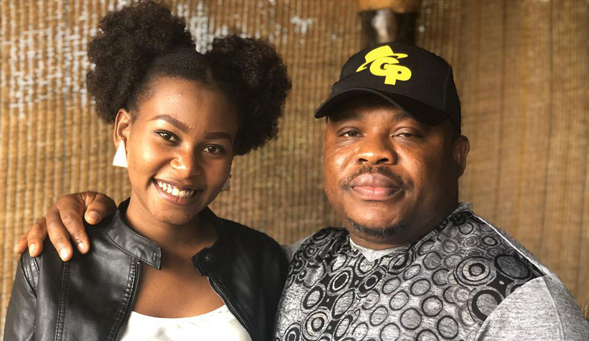 Fast-rising local songstress, Aline Sano with Godfatheru2019 CEO Michael Ogoke (right) . Courtesy photo.