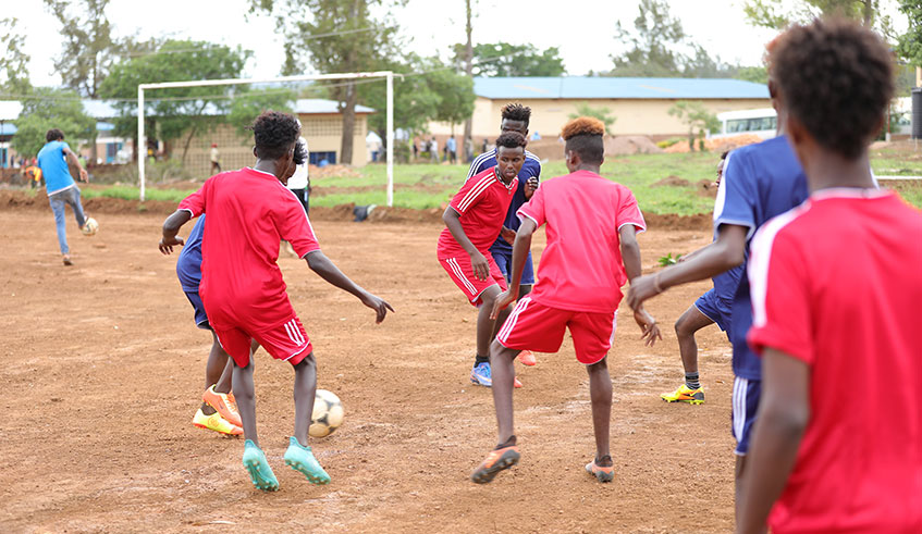 Some of the refugees at Gashora Transit Centre play football yesterday. Emmanuel Kwizera.