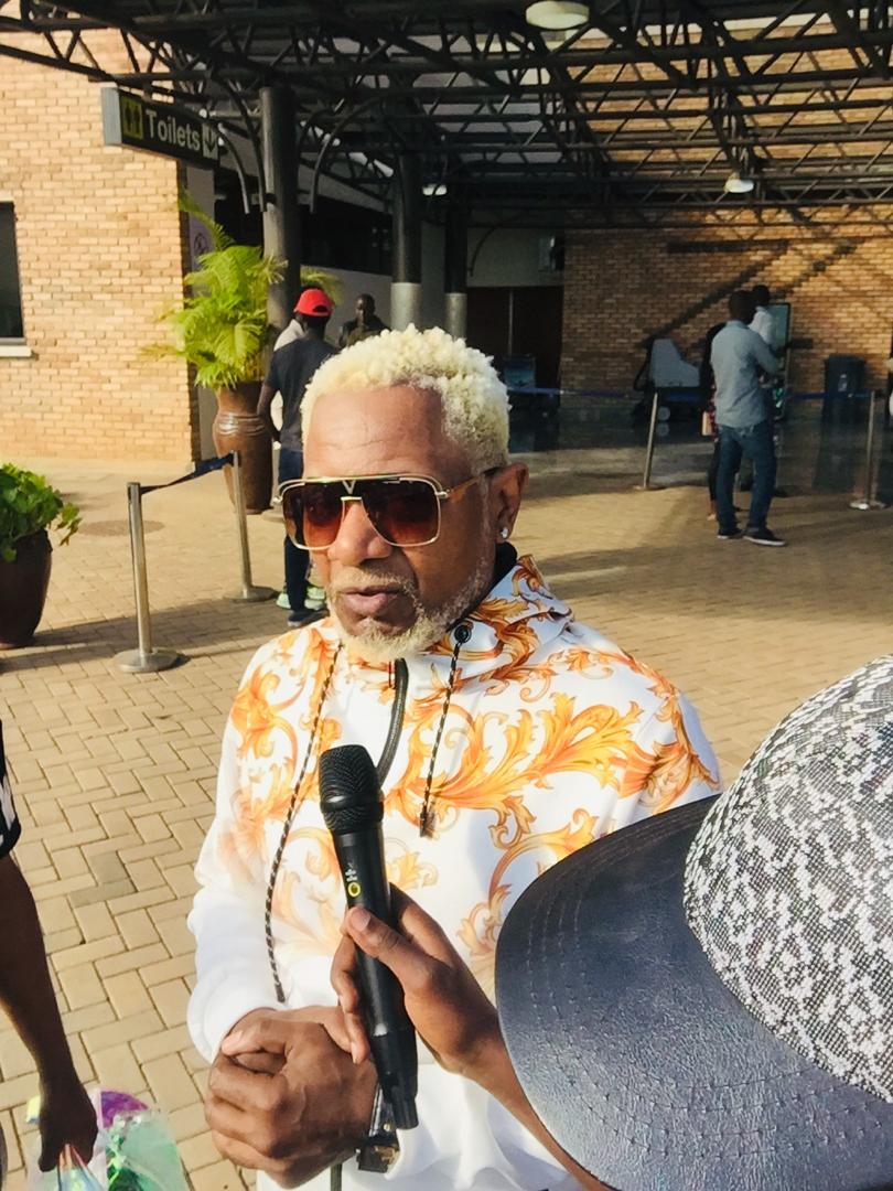 Awilo Longomba speaks to journalists upon his arrival at Kigali International Airport today ahead of Kigali Jazz Junction on Friday. / Courtesy