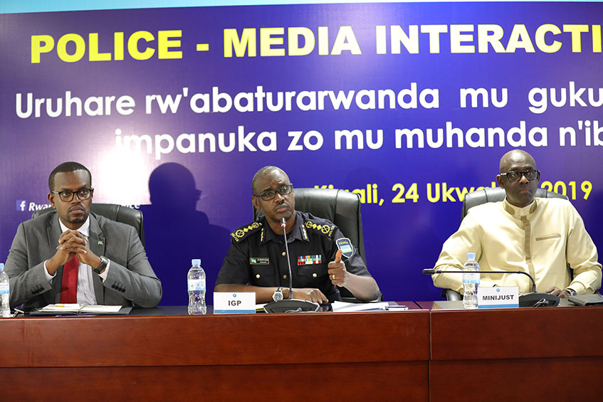 IGP Dan Munyuza, flanked by Justice Minister, Johnston Busingye (R) and Prosecutor General, Jean Bosco Mutangana. (Courtesy)