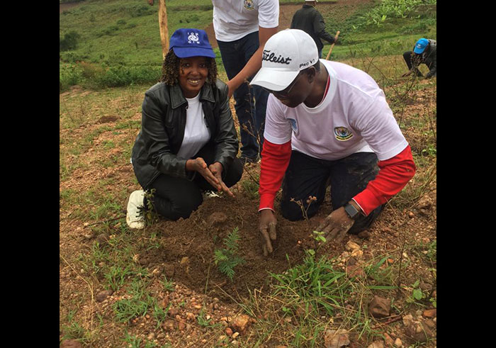 UN Resident Coordinator Fode Ndiaye (R) plants a tree in Kamonyi on Thursday. (Courtesy)