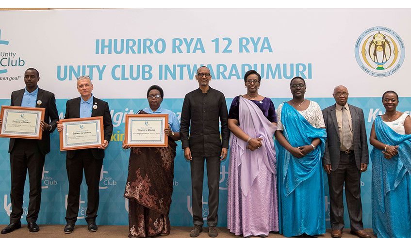President Paul Kagame and First Lady Jeannette Kagame and other top members of Unity Club in a group photo with the 2019 recipients of the Abarinzi bu2019Igihango award. The recipients this year are (L-R) Serge Gasore, Carl Wilkins and Daphrose Mukarutamu. Village Urugwiro  