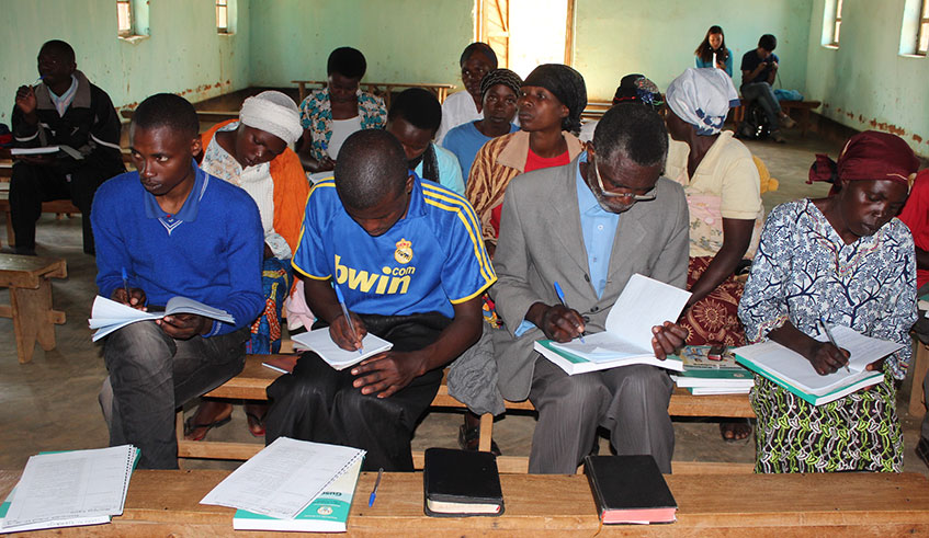 Adults take literacy classes in Muhanga District in 2017. Emmanuel Kwizera.