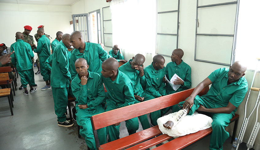The 25 RNC militia suspects at the Military Tribunal in Nyamirambo on October 14, 2019.The terror suspects, captured in DR Congo, have applauded the Government for the treatment they have received. Emmanuel Kwizera.