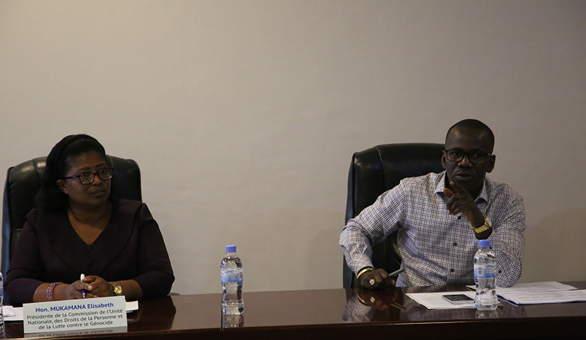 Minister of State in charge of Constitutional and Legal Affairs, Evode Uwizeyimana speaks to members of the Parliamentary Standing Committee as the Committee chairperson looks on./ Sam Ngendahimana