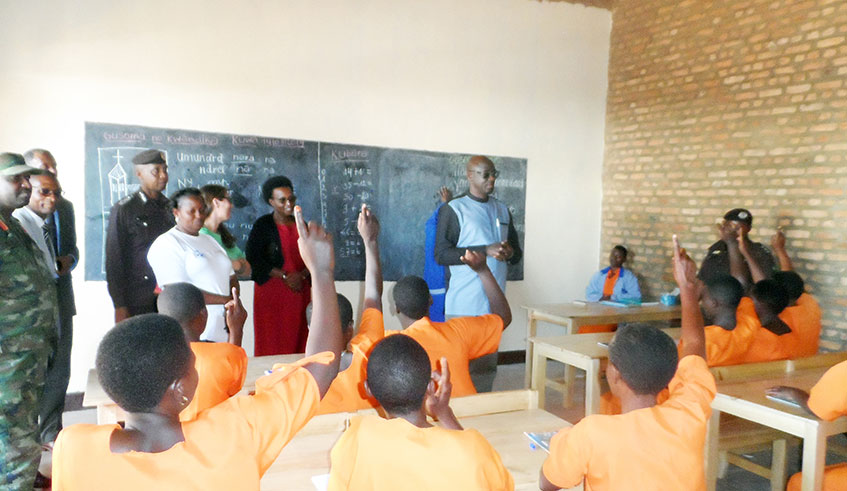 Female inmates attend classes. File