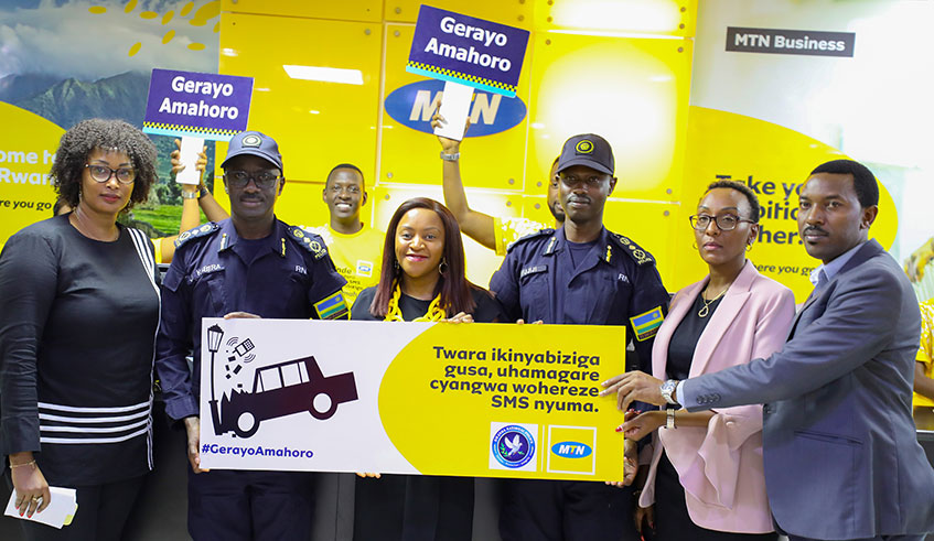 CP John Bosco Kabera, MTN-Rwanda CEO Mitwa Kaemba Ngu2019ambi, CP Rafiki Mujiji and other officials at the launch of the partnership to promote road safety. Courtesy.