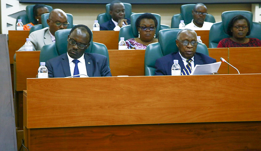 The President of the National Unity and Reconciliation Commission (NURC), Bishop John Rucyahana (right), presents the institutionu2019s annual report to the Senate alongside Fidele Ndayisaba, the Commissionu2019s Executive Secretary. Courtesy.