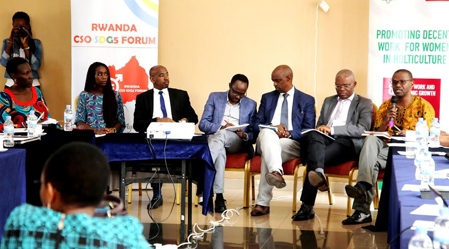 The panelists from left to right. Annette Mukiga, the moderator, RWN's Odette Ntambara, Richard Mushabe (MINECOFIN), Andrews Kananga(Legal Aids Forum), RDO's Eugene Rwabasira, Apollinaire Mupiganyi, and Eli Mugabowishema. / Courtesy