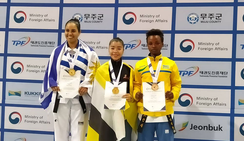Clarisse Uwayo (R) finished third in womenu2019s poomsae competition. Courtesy.