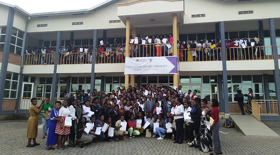 A total of 214 girls who received university scholarships from FAWE Rwanda and MasterCard Foundation pose for a photo at INES Ruhengeri premises in Musanze District. / Ru00e9gis Umurengezi