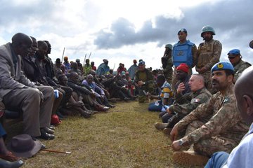 A November 14 photo of MONUSCO officials with some of the displaced Banyamulenge civilians in Minembwe./Courtesy
