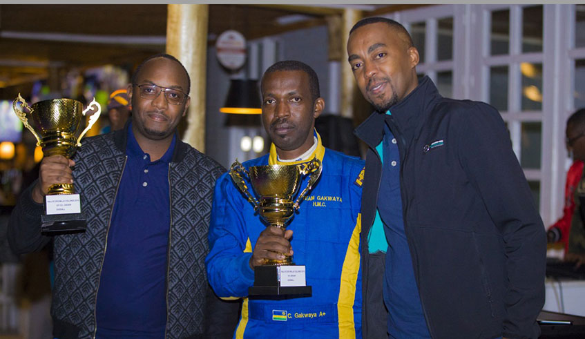 L-R: Fernand Rutabingwa, Jean Claude Gakwaya, and RAC president Christian Gakwaya posse for a photo. Jejje Muhinde.