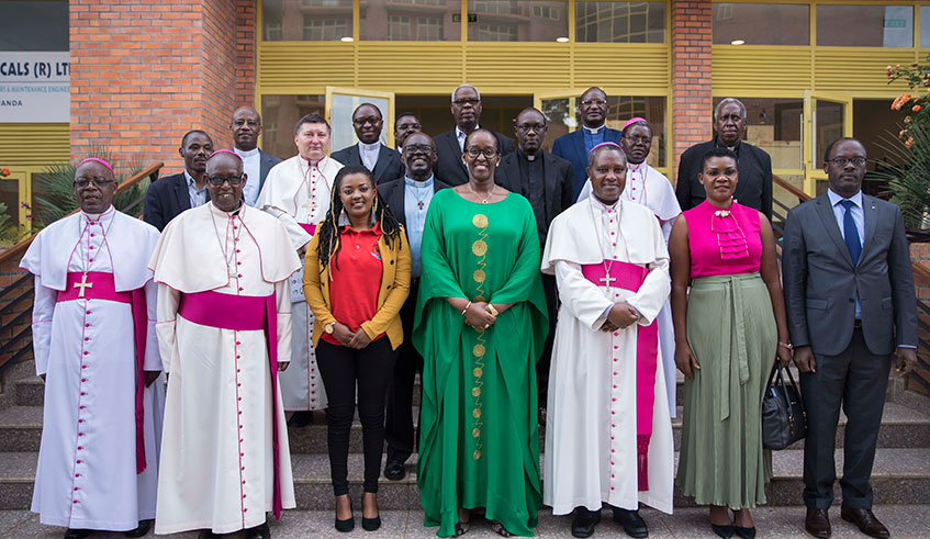 First Lady Jeannette Kagame and other officials join members of the Episcopal Conference of the Catholic Church who include the Archbishop of Kigali, Bishop Antoine Kambanda (third from right). The First Lady urged the clerics to tailor their sermons to the national context so as to have a greater impact on the national unity and reconciliation. Courtesy.