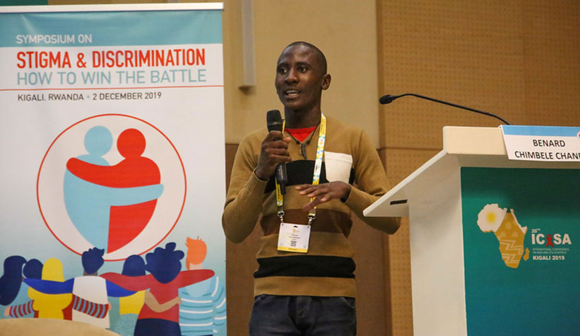 Bernard Chanda, 21, speaks during the symposium on stigma and discrimination (Photo by Dan Nsengiyumva)