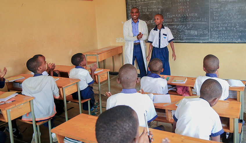 A teacher delivers a lesson to pupils of SOS Children Village Kacyiru. Photo: S. Ngendahimana.