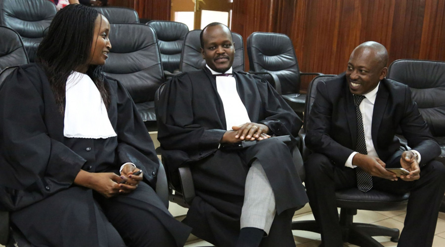 Florida Kabasinga with fellow lawyers Mou00efse Nkundabarashi and Richard Mugisha at another hearing at Supreme Court last year. 