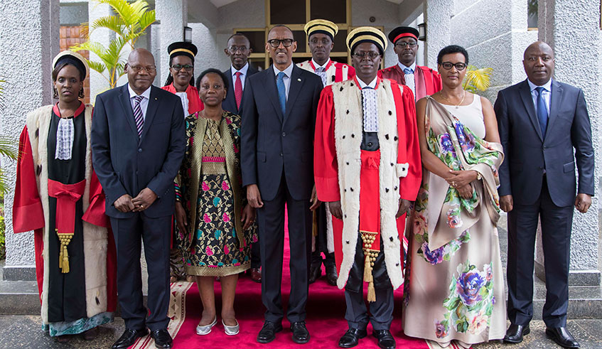 President Kagame and other senior government officials in a group photo with the newly-sworn in leaders of the judiciary, including new Chief Justice Faustin Ntezilyayo and his deputy Marie-Thu00e9ru00e8se Mukamulisa, and the new Prosecutor General Aimable Havugiyaremye and his deputy Angu00e9lique Habyarimana. During the ceremony held at parliament, the President told them that they have found a firm foundation laid by their predecessors and should build on it for further progress.  Photo: Village Urugwiro.