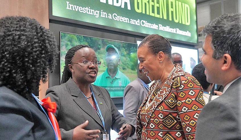 Minister of Environment, Jeanne du2019Arc Mujawamariya (2nd left) interacts with other delegates at COP25 in Madrid yesterday.  (Courtesy)