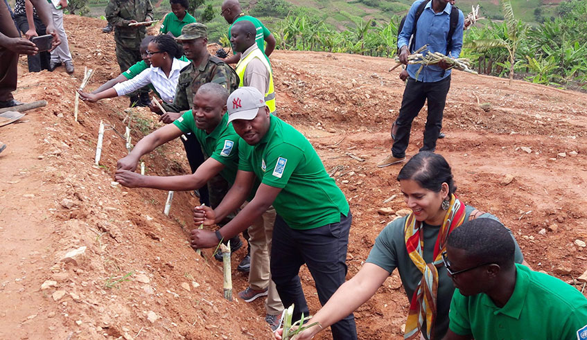 Officials and youth join residents of Ndaro sector during the launch of Youth Ecobrigade Programme. Courtesy.