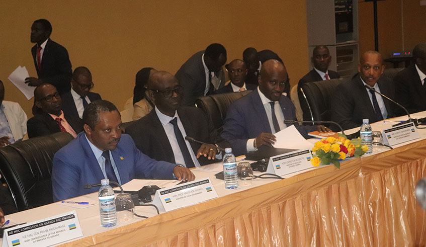 The Rwandan delegation led by State Minister for EAC Amb. Olivier Nduhungirehe (centre), seen here with other ministers (from left) Prof. Anastase Shyaka (Local Government), Johnston Busingye (Justice) and Patrick Nyamvumba (Internal Affairs) during the meeting in Kampala yesterday. Photo: Courtesy.