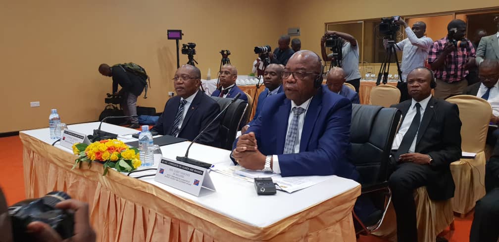 DR Congo's Deputy Prime Minister, Gilbert Kakonde Malamba (R) and Angola's Minister for external relations, Manuel Domingos Augusto follow proceedings during the second meeting of the Ad Hoc Commission. (Photos by James Munyaneza)