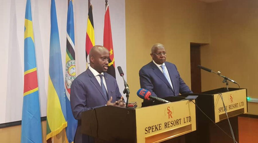 Amb. Olivier Nduhungirehe, State Minister for East African Community (L) and Sam Kutesa, Minister for Foreign Affairs of Uganda briefing media after a closed session that discussed the Uganda-Rwanda tense relations. 