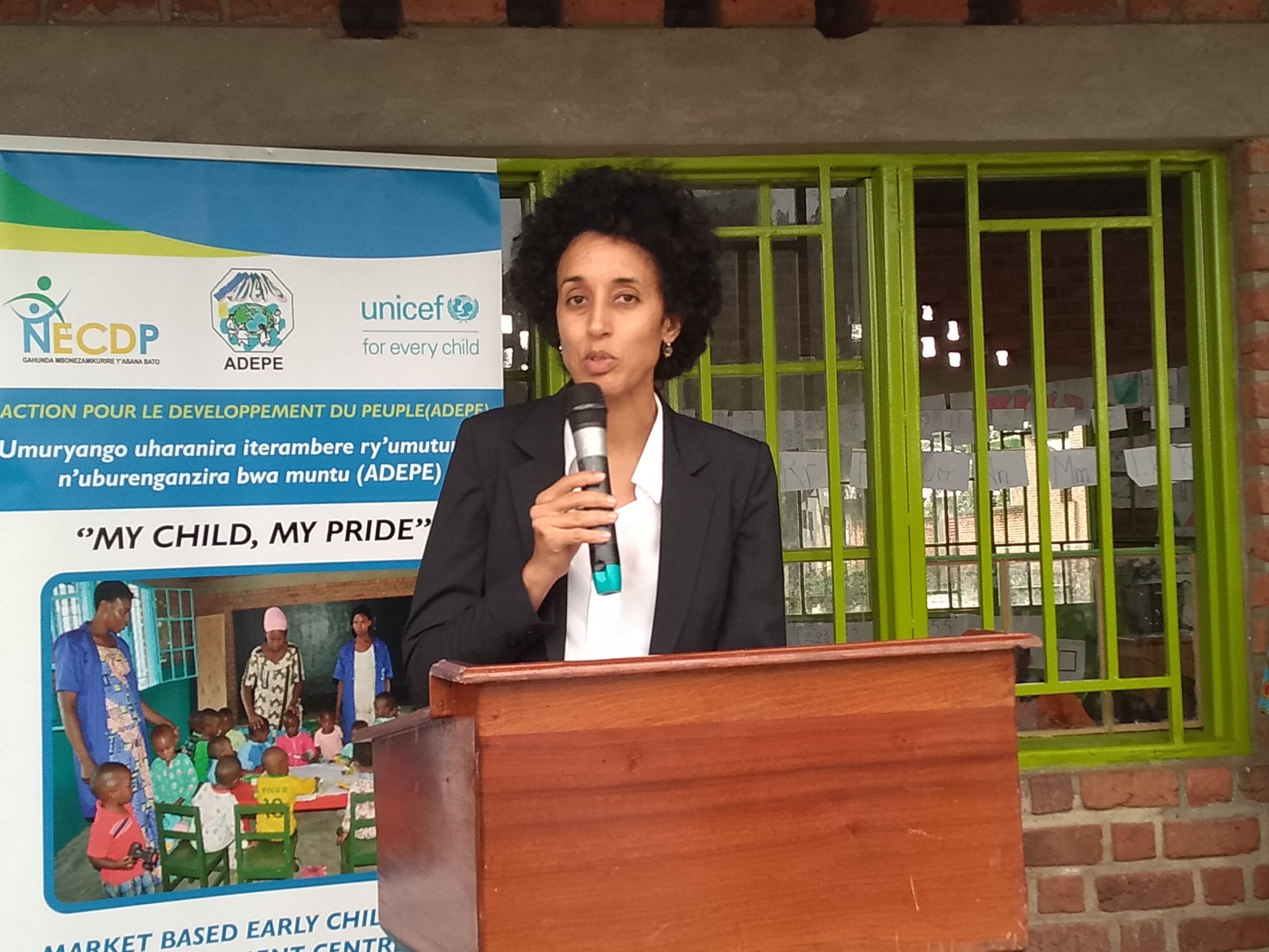 Freya De Clercq Zaninka, the Head of Early Learning, Positive Parenting, Child Protection, Disability and Special Needs at NECDP speaks at the inaugural of Rubavu Cross Border ECED centre. 