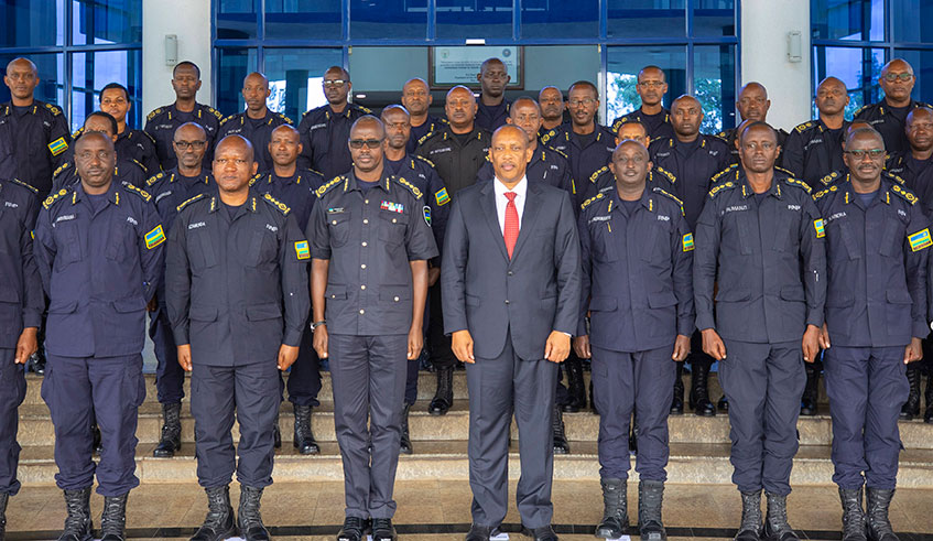 General Patrick Nyamvumba, the Minister for Internal Security (centre) in a group with senior police officers during the Police High Council meeting at Rwanda National Police General Headquarters in Kacyiru on Tuesday. Addressing the officers, Nyamvumba said that although a lot has been achieved, there is still much to be done in the direction of preventing and eliminating crimes.  Photo: Courtesy. 
