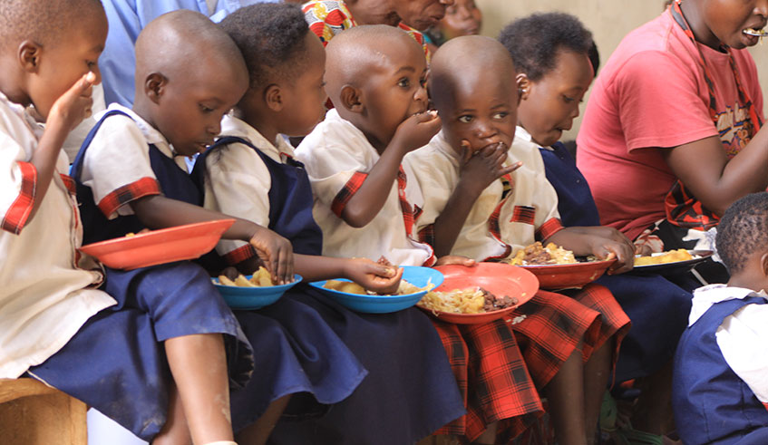Children having lunch at Itetero Bright Academy near Kayonza.