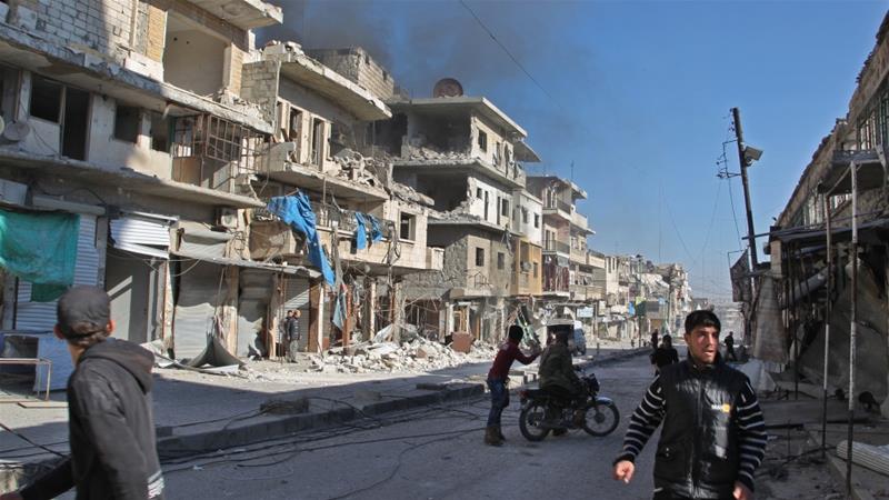 Smoke billows from a building following a reported bombardment by pro-Syrian government forces in the town of Maarat el-Numan in Syria's Idlib province on Friday. 