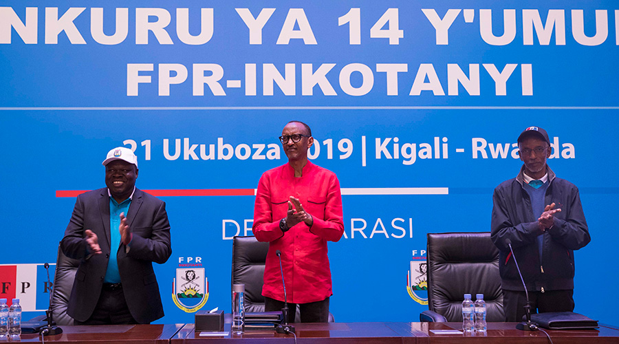 President Paul Kagame, RPF-Inkotanyi Chairman (centre); Vice-Chairman Christophe Bazivamo (left), and Secretary-General Franu00e7ois Ngarambe, during the partyu2019s 14th Congress at Intare Conference Arena in Kigali on Saturday. / Village Urugwiro