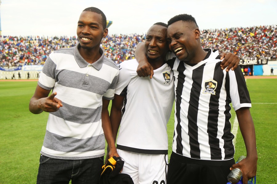 Andrew Butera with fans just celebrating. / Sam Ngendahimana