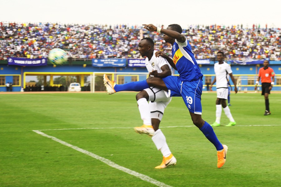 APR head coach Adil Mohammed Erradi celebates the victory with fans after stunning Rayon Sports 2-0 at Amahoro National Stadium yesterday. / Sam Ngendahimana