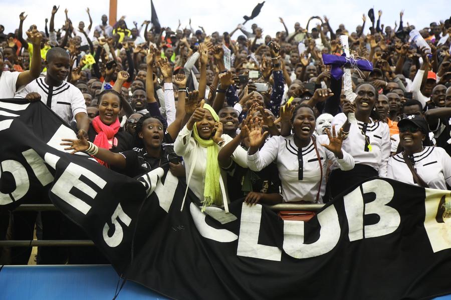 Army side fans cheer on their players. / Sam Ngendahimana
