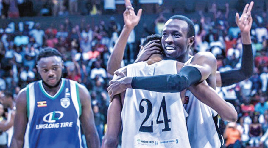 Dieudonne Ndizeye celebrates with teammate Jean-Victor Mukama (#24) after Patriots beat City Oilers 81-59 to reach the qualifiers final at Kigali Arena on Saturday. 