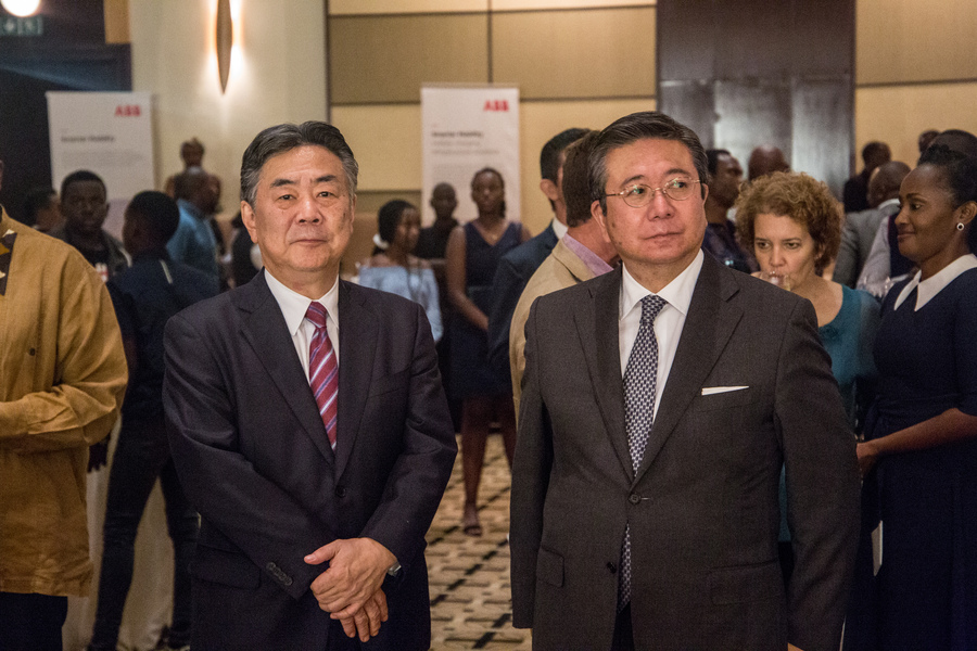 Mitsubishi Middle East and Africa President and the new Japanese ambassador to Rwanda Mr. Masahiro (left) share a moment during the launch of the PHEV Outlander, Mitsubishi's hybrid SUV. The event took place on 20 December in Kigali. / Dan Nsengiyumva