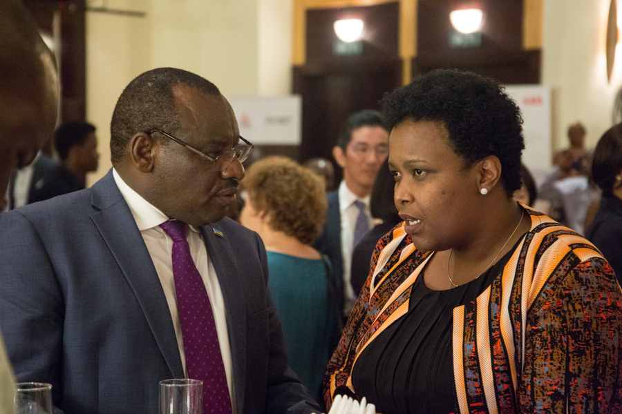 Rwanda's Minister of Infrastructure, Ambassador Claver Gatete and RDB's Chief Executive Hon. Clare Akamanzi share a moment during the launch of the PHEV Outlander. / Dan Nsengiyumva