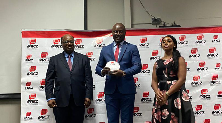  Zimbabwe's Deputy Chief Secretary in Office of the President and Cabinet Dr Nicholas Tikitiki (left) Rwanda embassy official Pascal Karemera (middle) and  IPRCZ board chair Ruwarashe Matambo pose for a photo after the awards. 