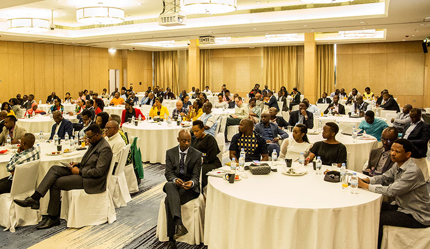 Members of the Rwandan diaspora follow Minister for Foreign Affairs Dr Vincent Birutau2019s remarks at Kigali Marriott Hotel yesterday. Photo: Dan Nsengiyumva.