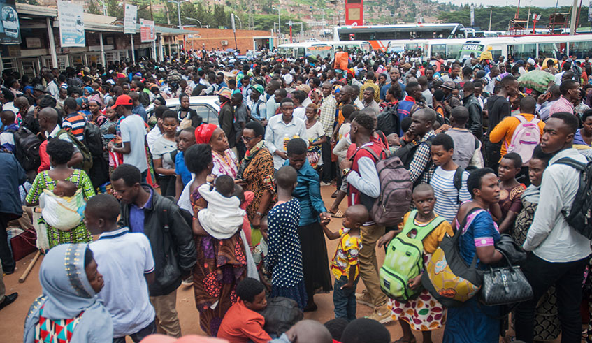 Passengers queue at Nyabugogo bus terminal yesterday. There was high demand for public transport as many people headed to the countryside for Christmas.  Photo: 