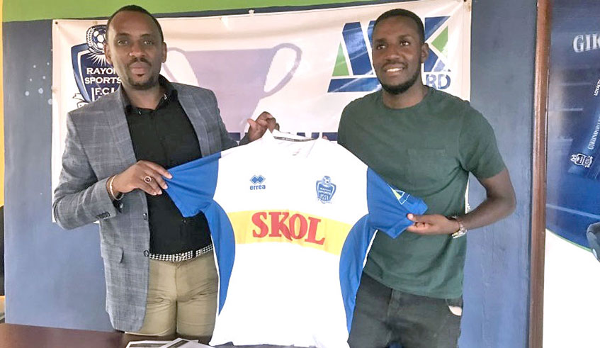 The signing of Soter Kayumba (R) was announced on Tuesday. The towering defender won the 2013 Peace Cup with AS Kigali. Courtesy.