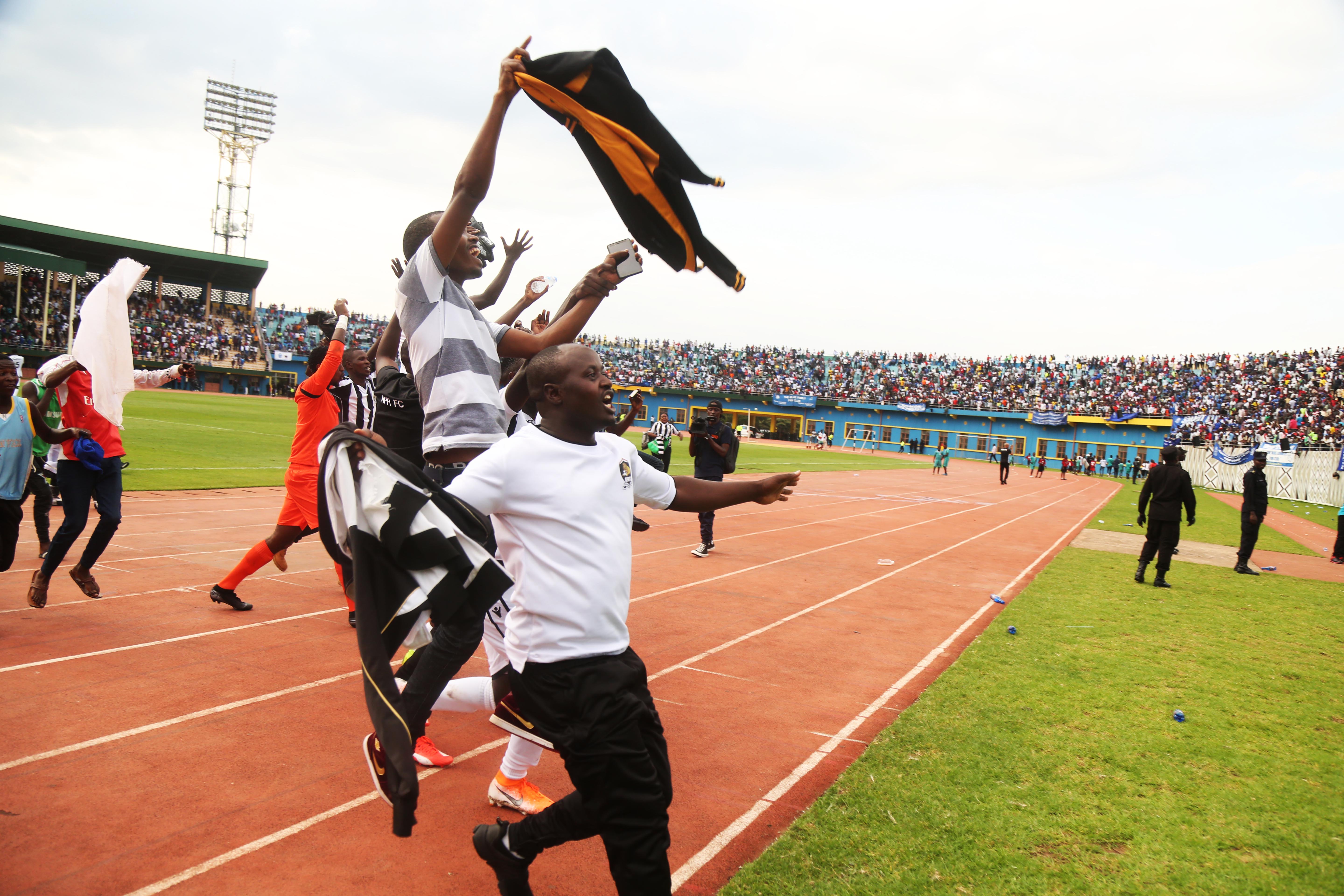 Players celebrate the first goal. / Sam Ngendahimana
