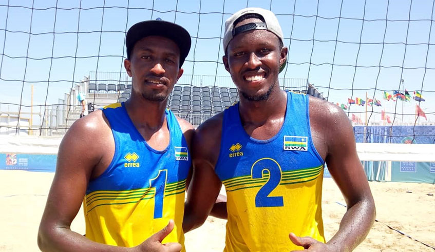 Olivier Ntagengwa (L) and Patrick Kavalo Akumuntu won bronze at this yearu2019s All-Africa Games in menu2019s beach volleyball in September. Courtesy.
