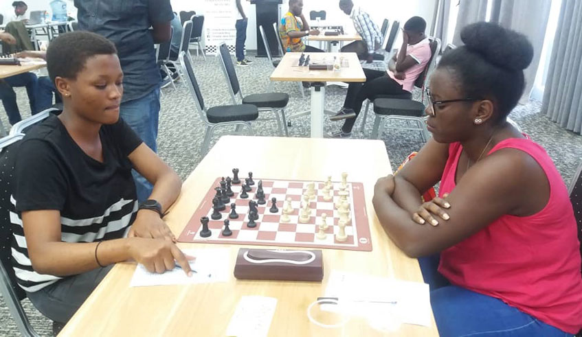 Sandrine Uwase (L) snatched a hard fought win against Marie Faustine Shimwa in round 4 to retain the title with one match to spare in Sunday's round 5. 