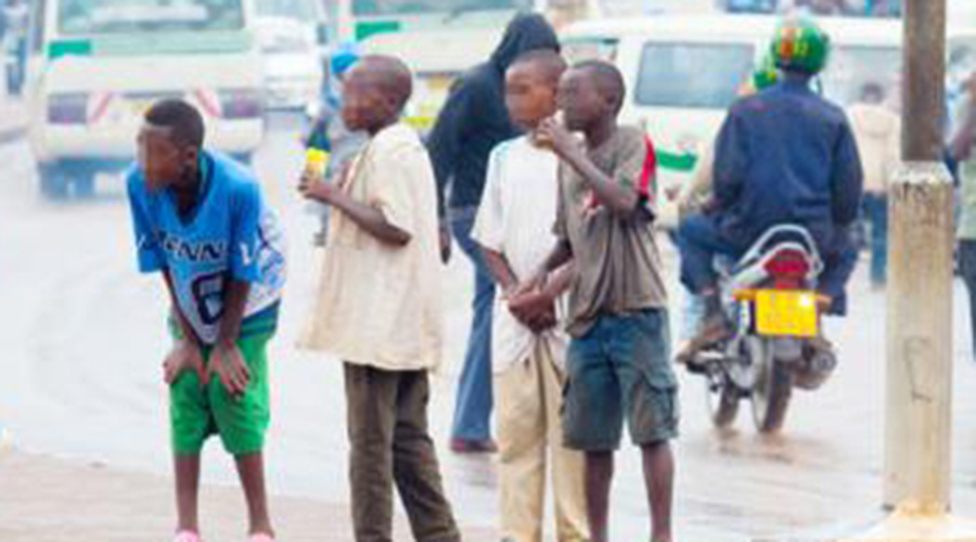 Children on a road in Kigali. Many had a bitter Christmas due to the heavy rains. 