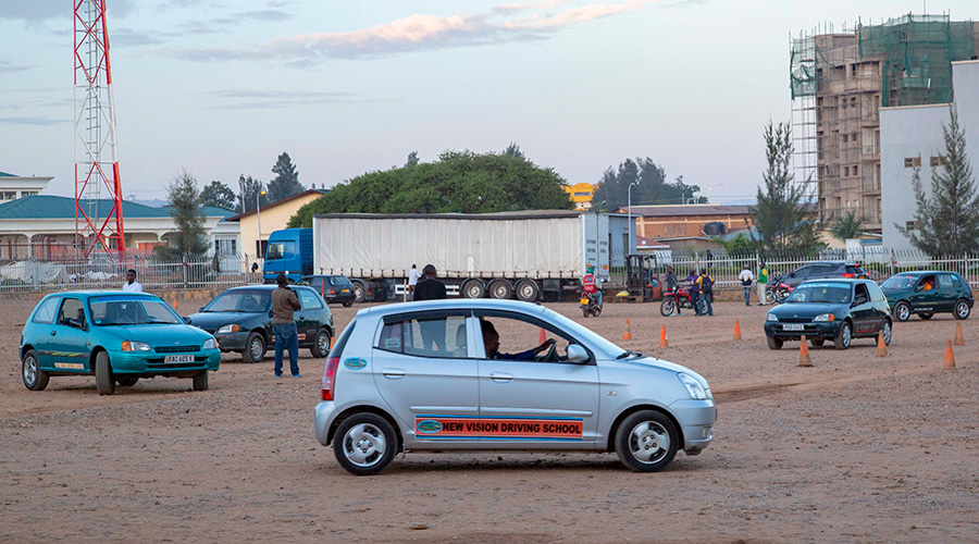 Driving learners in the field next to Amahoro National Stadium in Remera. 