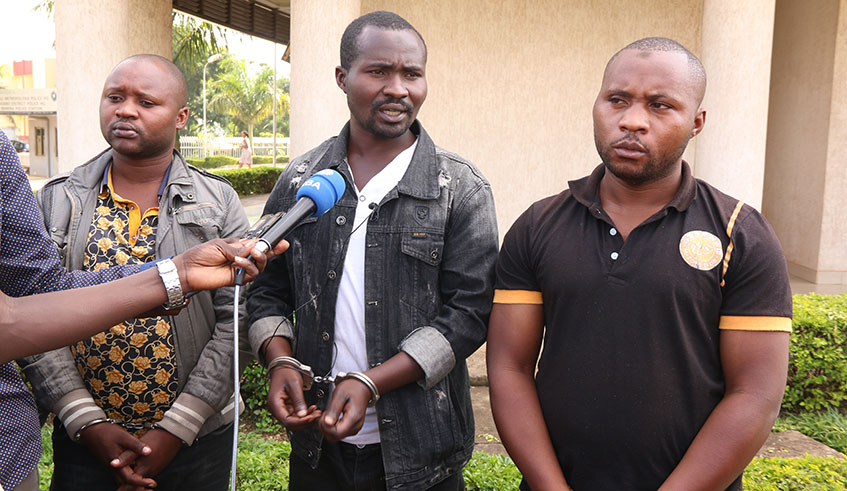 Suspects Christian Ngirimana, Daniel Ndagijimana and Mussa Ndagijimana speak to the media at Remera Police station. Photo: