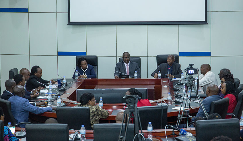 Musa Fazil Harerimana (right) speaks during a meeting between Members of Parliament and City of Kigali officials at the city hall on December 30, 2019. Looking on are Edda Mukabagwiza, the Vice Speaker in charge of Legal Affairs and Government Oversight (left) and City of Kigali Mayor Pudence Rubingisa (centre). Photo: 