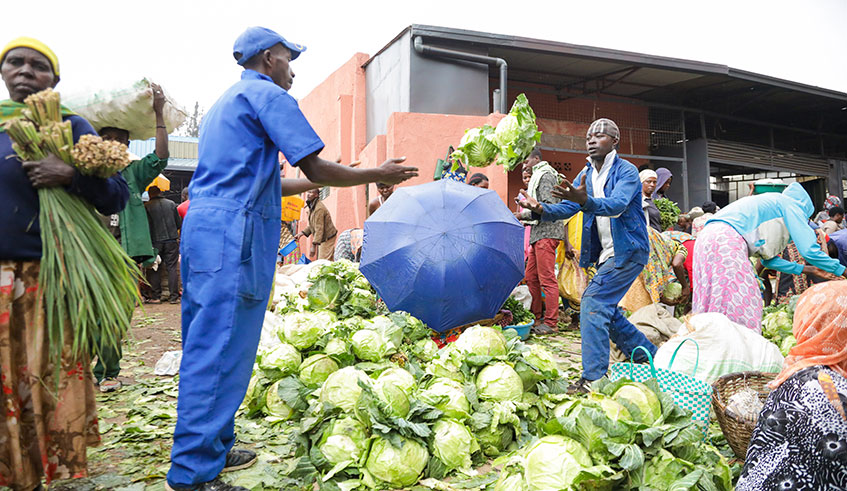 Market vendors in Nyabugogo market selling cabbages. Former street vendors say theyu2019ve reaped big from the festive season. Photo: 